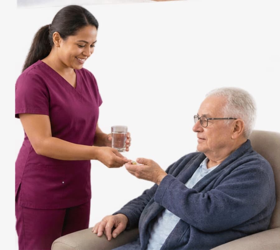 A caregiver handing a client a glass of water and medication